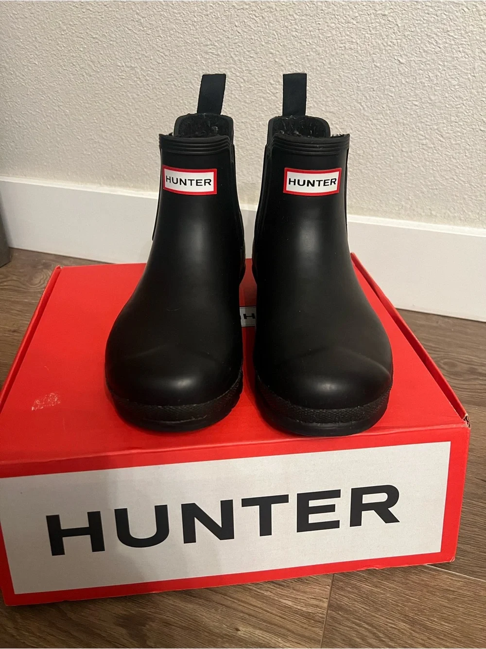 Hunter Women’s Black Chelsea Rain Boots with Red Logo
